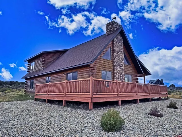a view of a backyard with a tub
