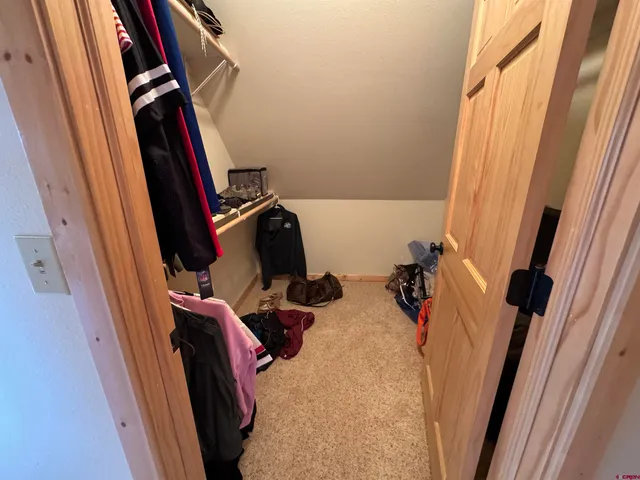 a view of a balcony with wooden floor