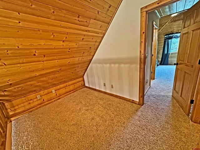 a view of deck with wooden floor and outdoor seating