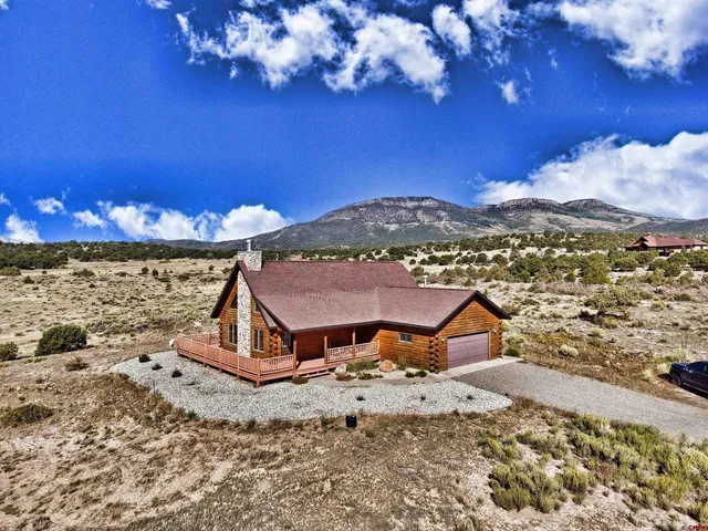 a view of a living room with furniture