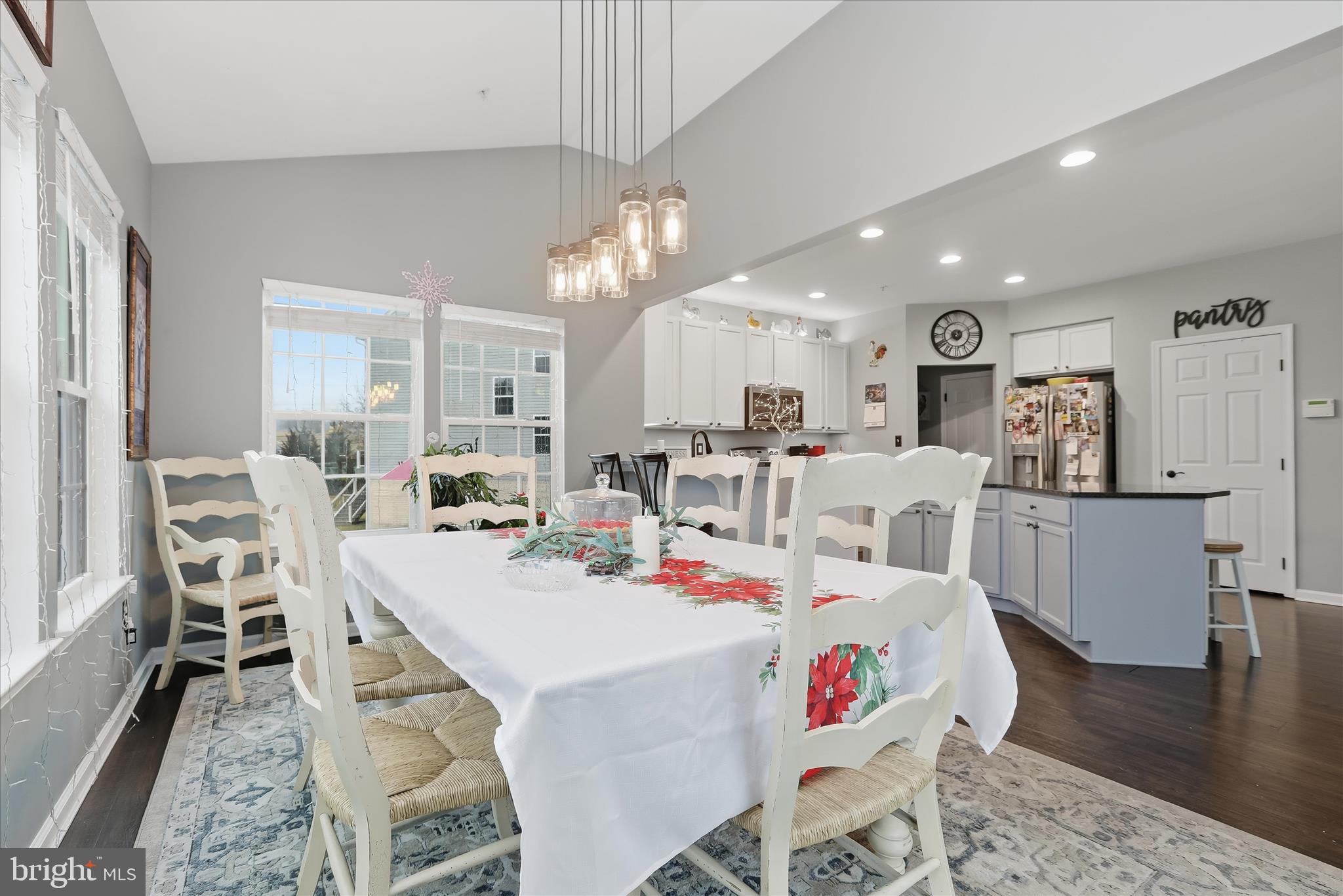 2760 Quantim Court Manchester, MD 21102 - Photo 14 of 33 a very nice looking dining room with kitchen island stainless steel appliances furniture a dining table and chairs