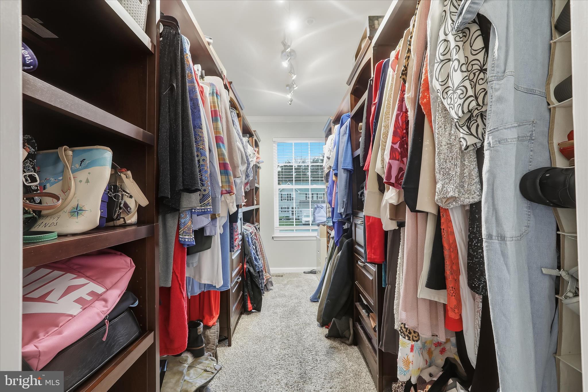 2760 Quantim Court Manchester, MD 21102 - Photo 19 of 33 a view of walk in closet with clothes and shoes