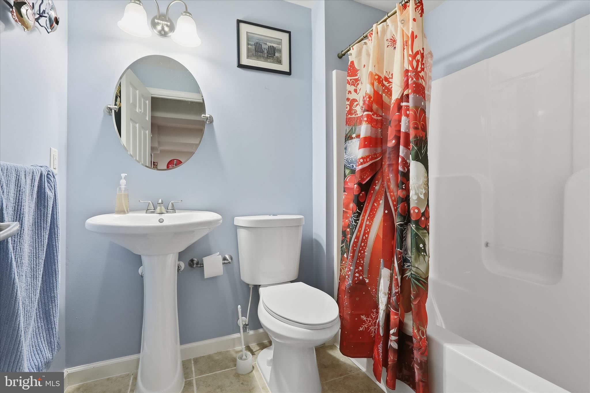2760 Quantim Court Manchester, MD 21102 - Photo 21 of 33 a bathroom with a sink toilet and a mirror