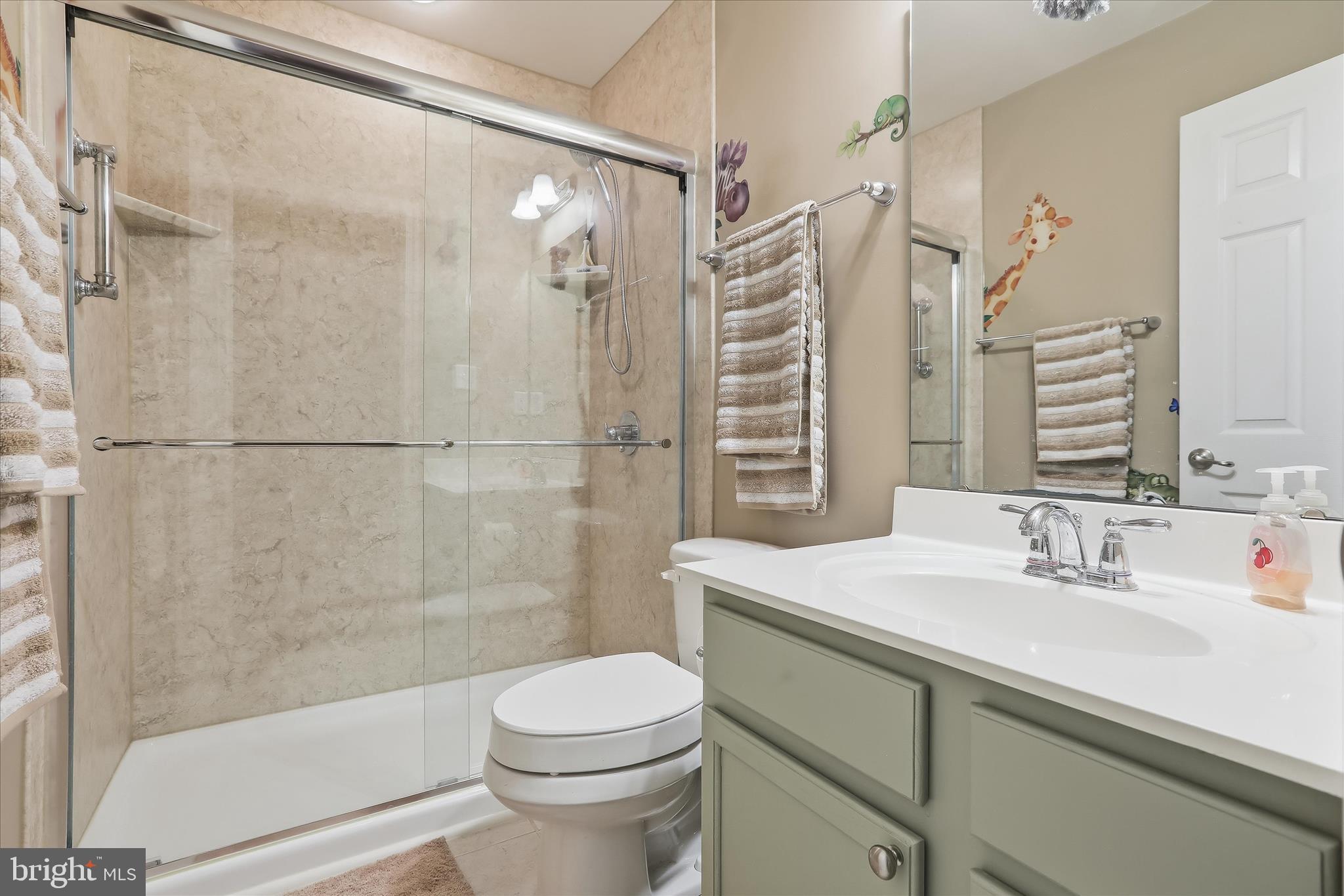 2760 Quantim Court Manchester, MD 21102 - Photo 23 of 33 a bathroom with a sink a toilet and shower