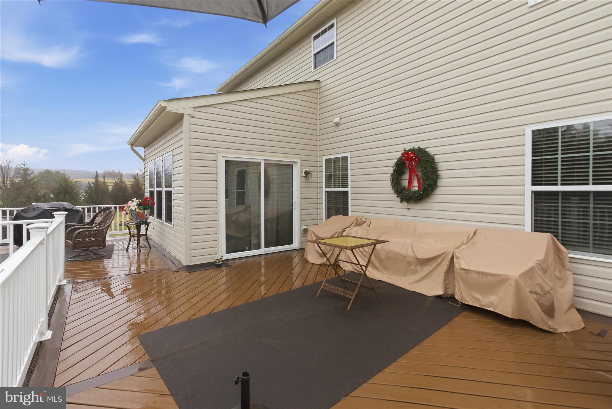 2760 Quantim Court Manchester, MD 21102 - Photo 28 of 33 a roof deck with table and chairs
