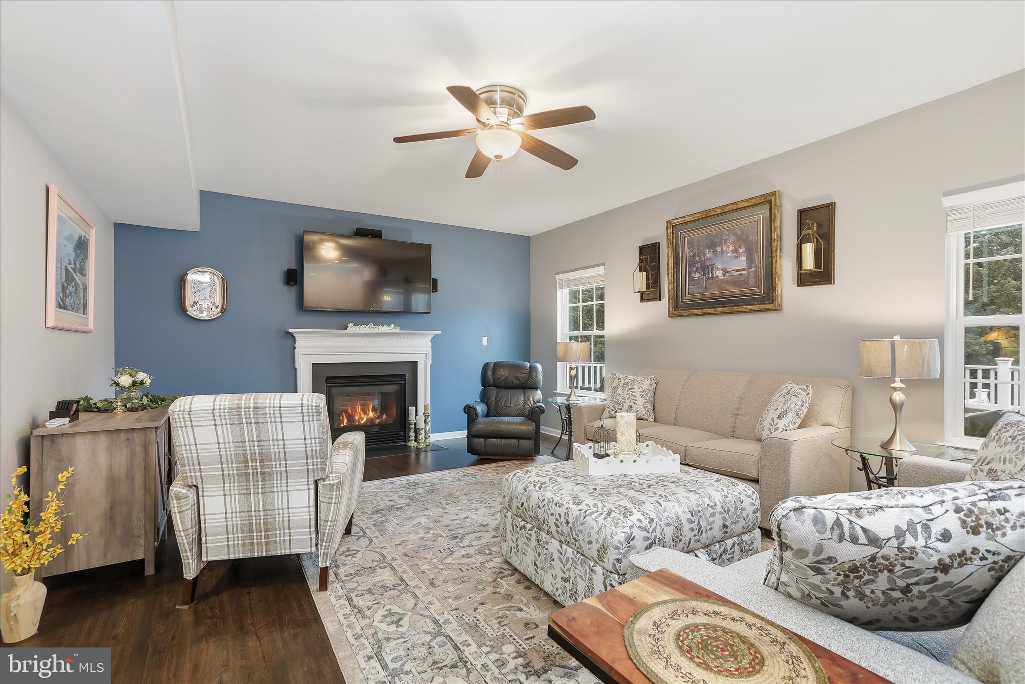 2760 Quantim Court Manchester, MD 21102 - Photo 7 of 33 a living room with furniture a fireplace and wooden floor
