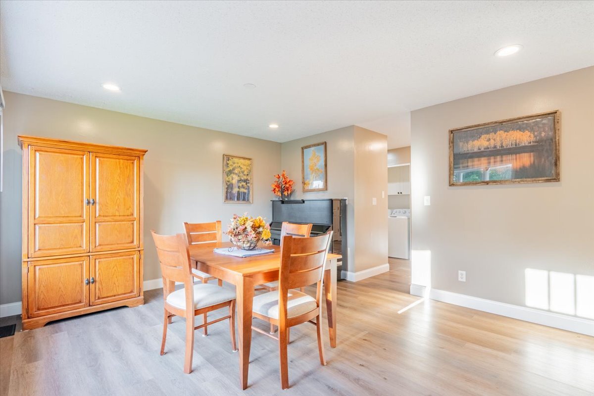 16 Holly Drive Clinton, IL 61727 - Photo 2 of 34 a view of a dining room with furniture and wooden floor