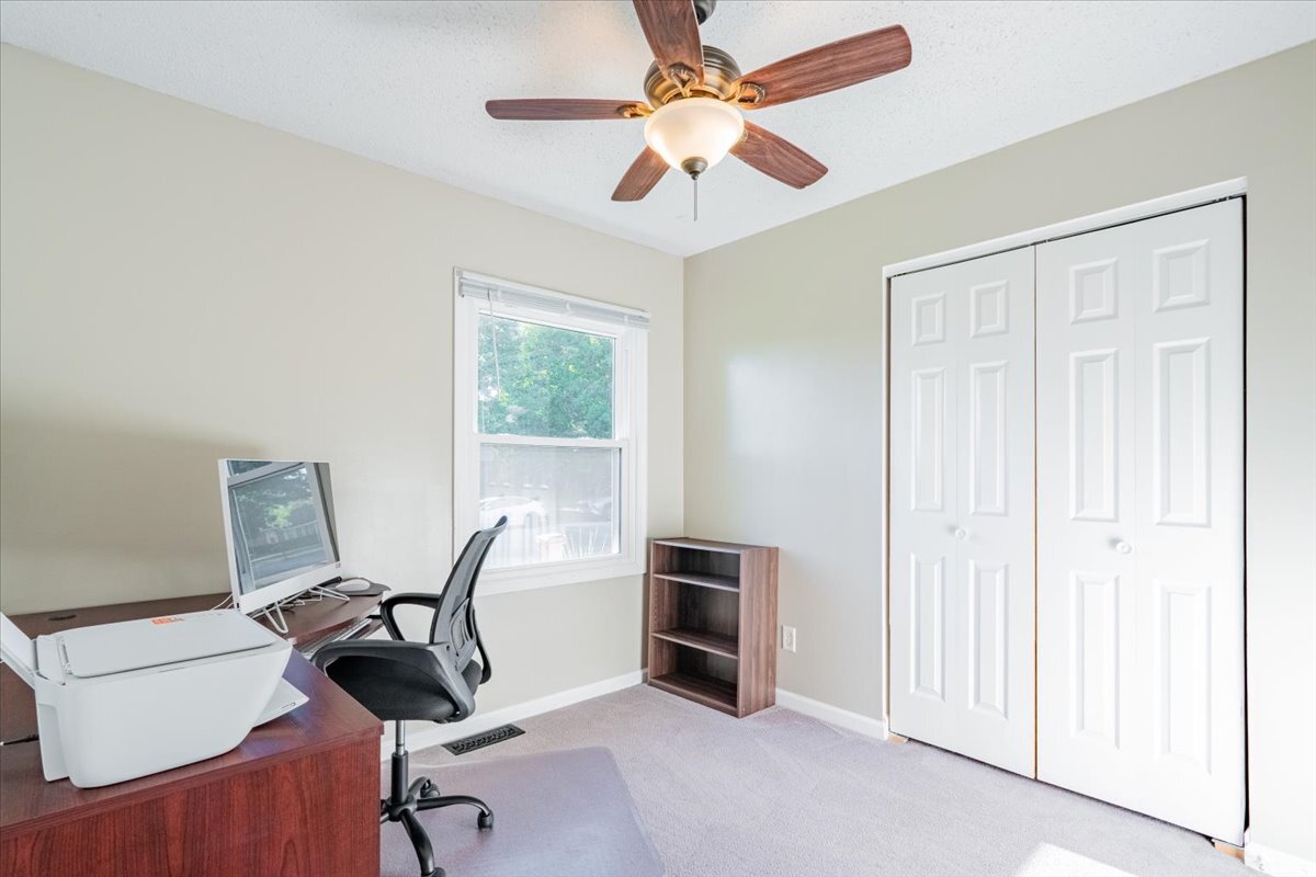 16 Holly Drive Clinton, IL 61727 - Photo 23 of 34 a view of a workspace with furniture and a window