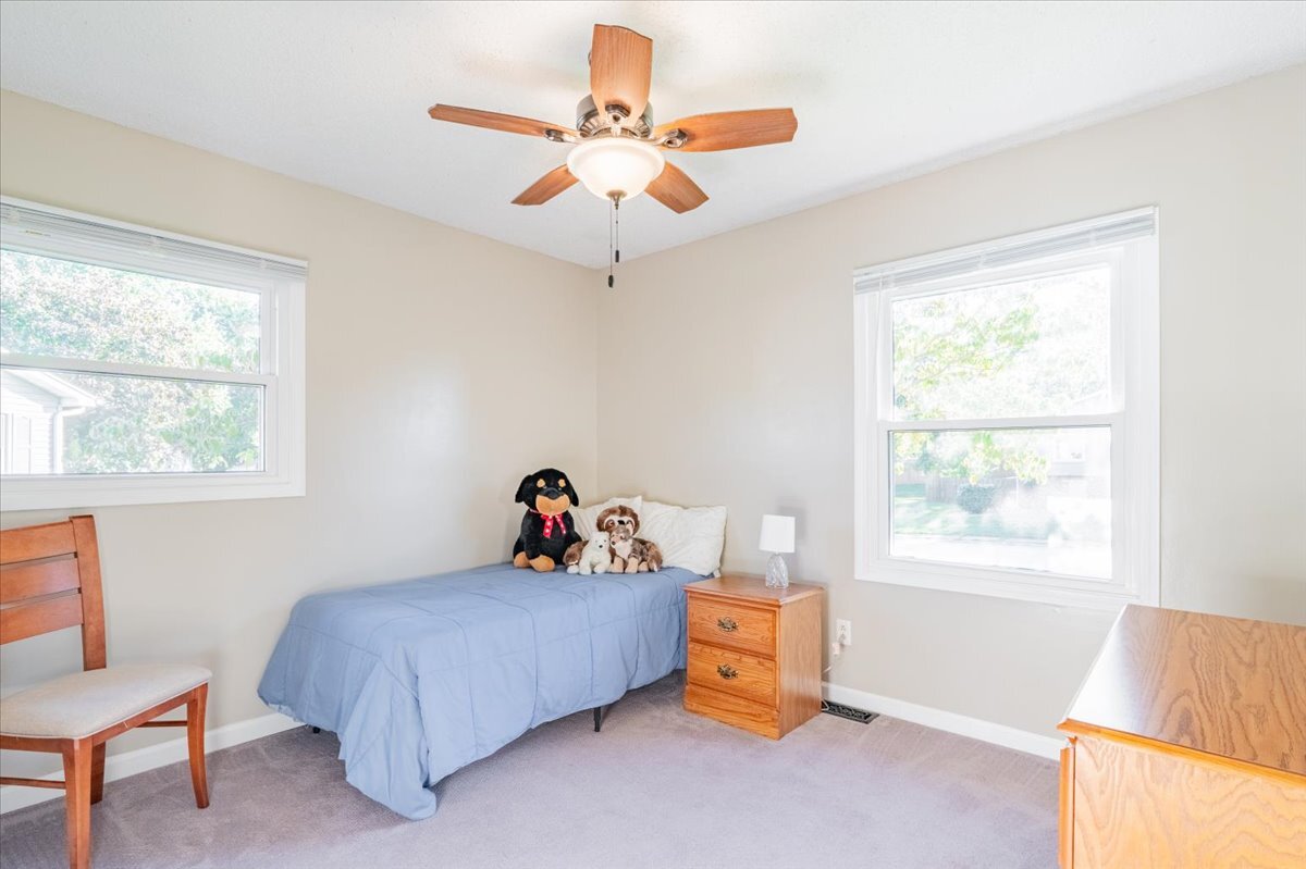 16 Holly Drive Clinton, IL 61727 - Photo 25 of 34 a bed room with a bed and a window