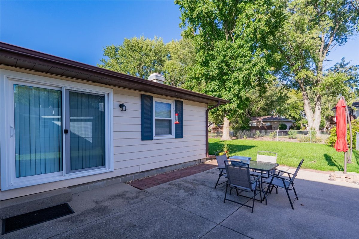 16 Holly Drive Clinton, IL 61727 - Photo 27 of 34 a view of a house with backyard and sitting area
