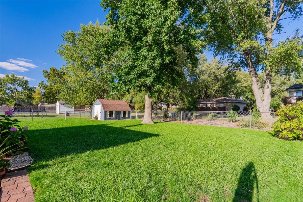 16 Holly Drive Clinton, IL 61727 - Photo 29 of 34 a front view of a house with garden