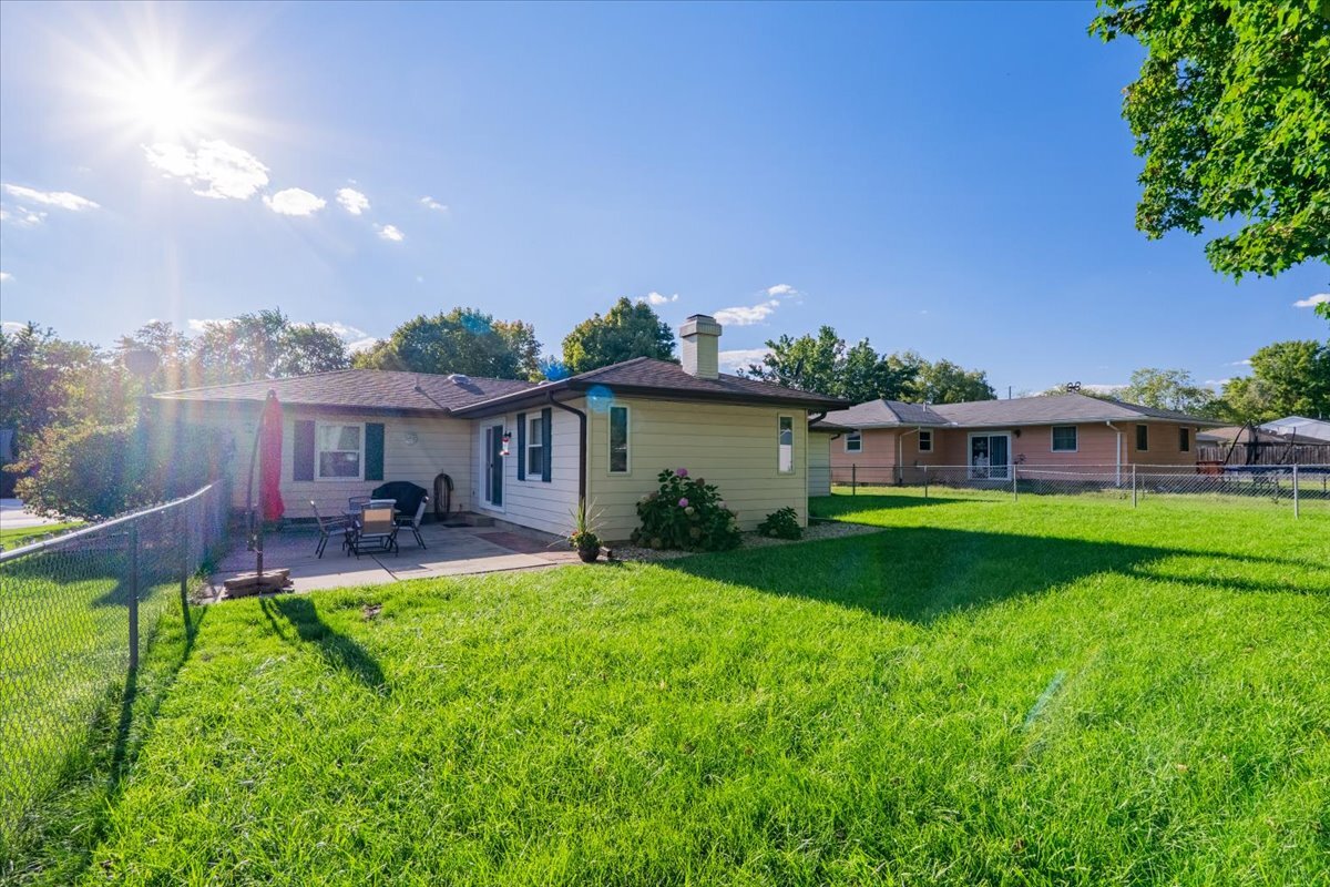 16 Holly Drive Clinton, IL 61727 - Photo 30 of 34 a view of a house with a yard porch and sitting area