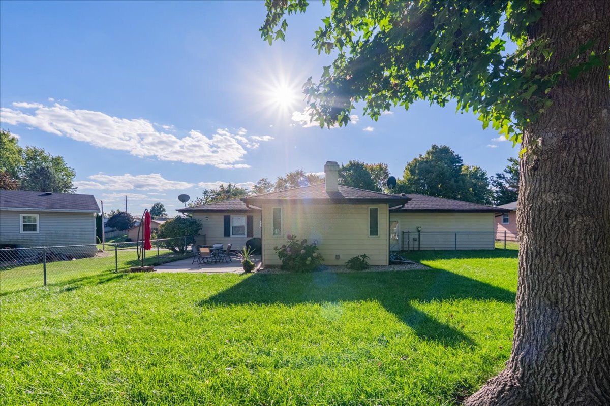 16 Holly Drive Clinton, IL 61727 - Photo 31 of 34 a view of a backyard with a garden and plants
