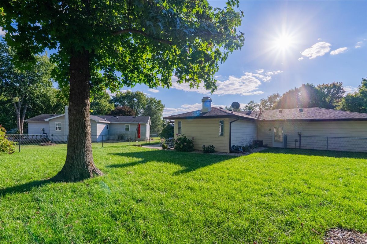 16 Holly Drive Clinton, IL 61727 - Photo 32 of 34 a view of a backyard with a garden and plants