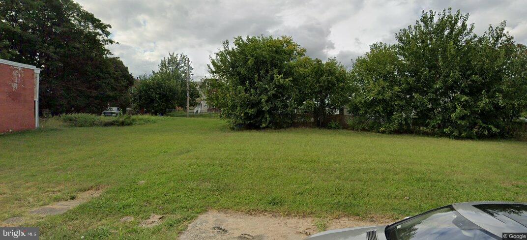710 West 6th Street Chester, PA 19013 - Photo 3 of 3 a view of a field of grass and trees