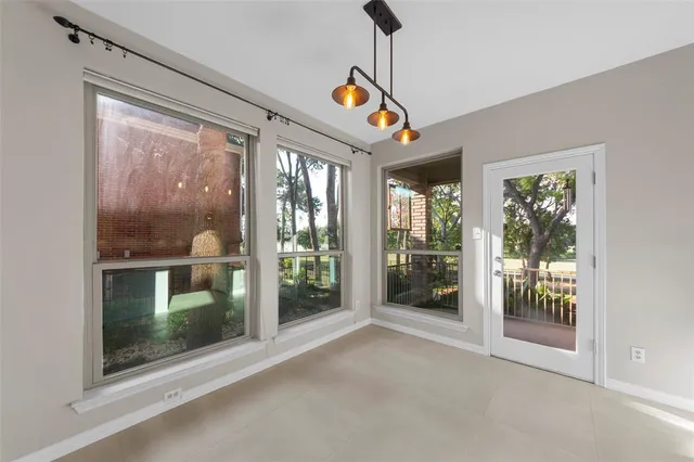 a view interior of a house with wooden floor and windows