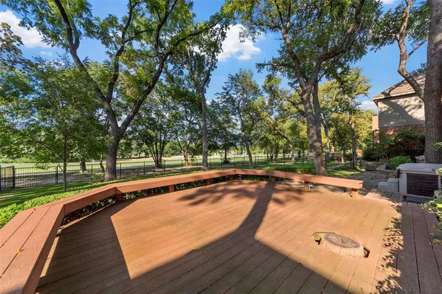 a view of swimming pool with a patio and a yard