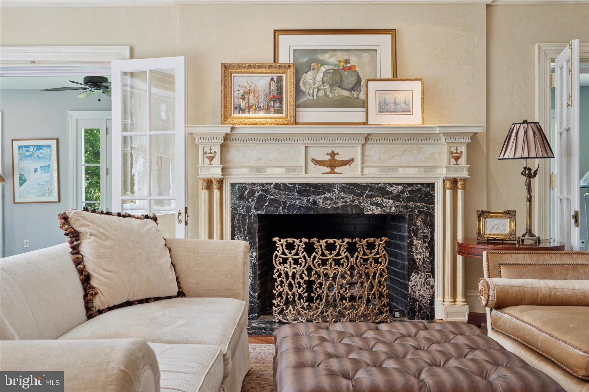 281 Winding Way Merion Station, PA 19066 - Photo 11 of 52 a living room with furniture and a fireplace
