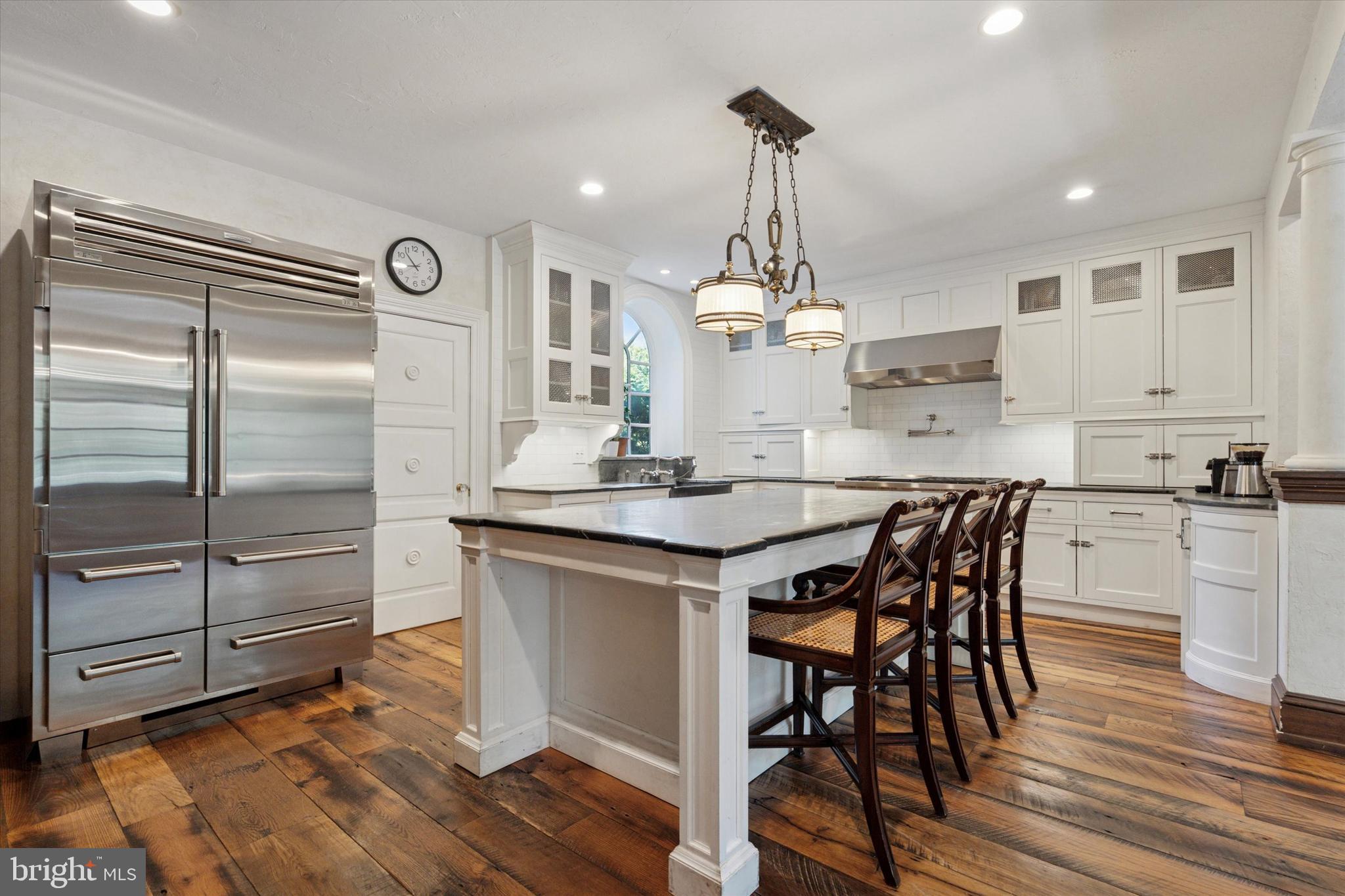 281 Winding Way Merion Station, PA 19066 - Photo 13 of 52 a kitchen with kitchen island a counter top space appliances and cabinets