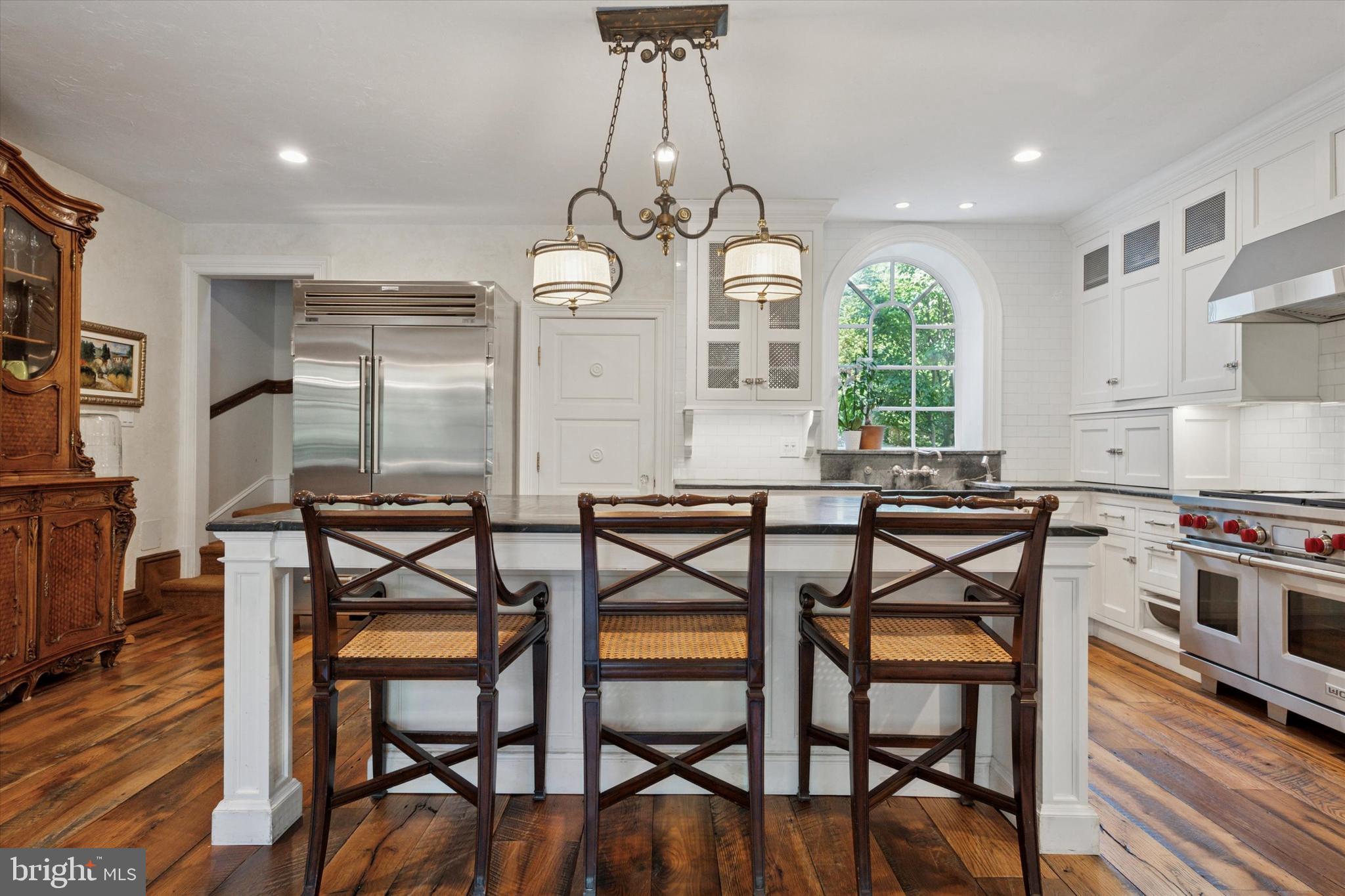 281 Winding Way Merion Station, PA 19066 - Photo 17 of 52 a view of a dining room with furniture window and wooden floor