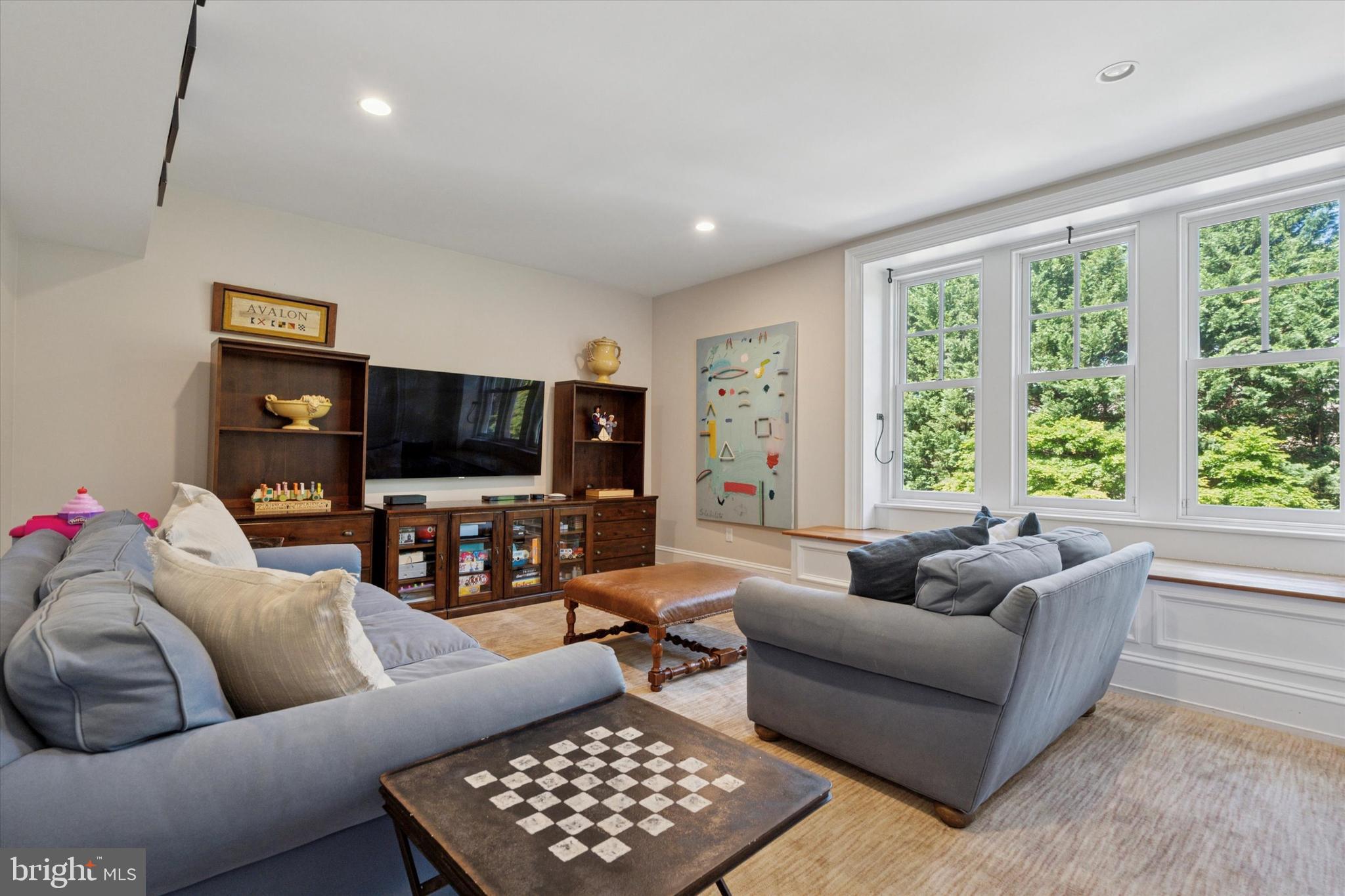 281 Winding Way Merion Station, PA 19066 - Photo 18 of 52 a living room with furniture and a flat screen tv