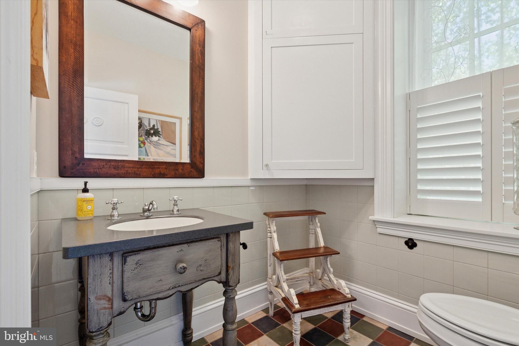 281 Winding Way Merion Station, PA 19066 - Photo 19 of 52 a bathroom with a sink and a mirror