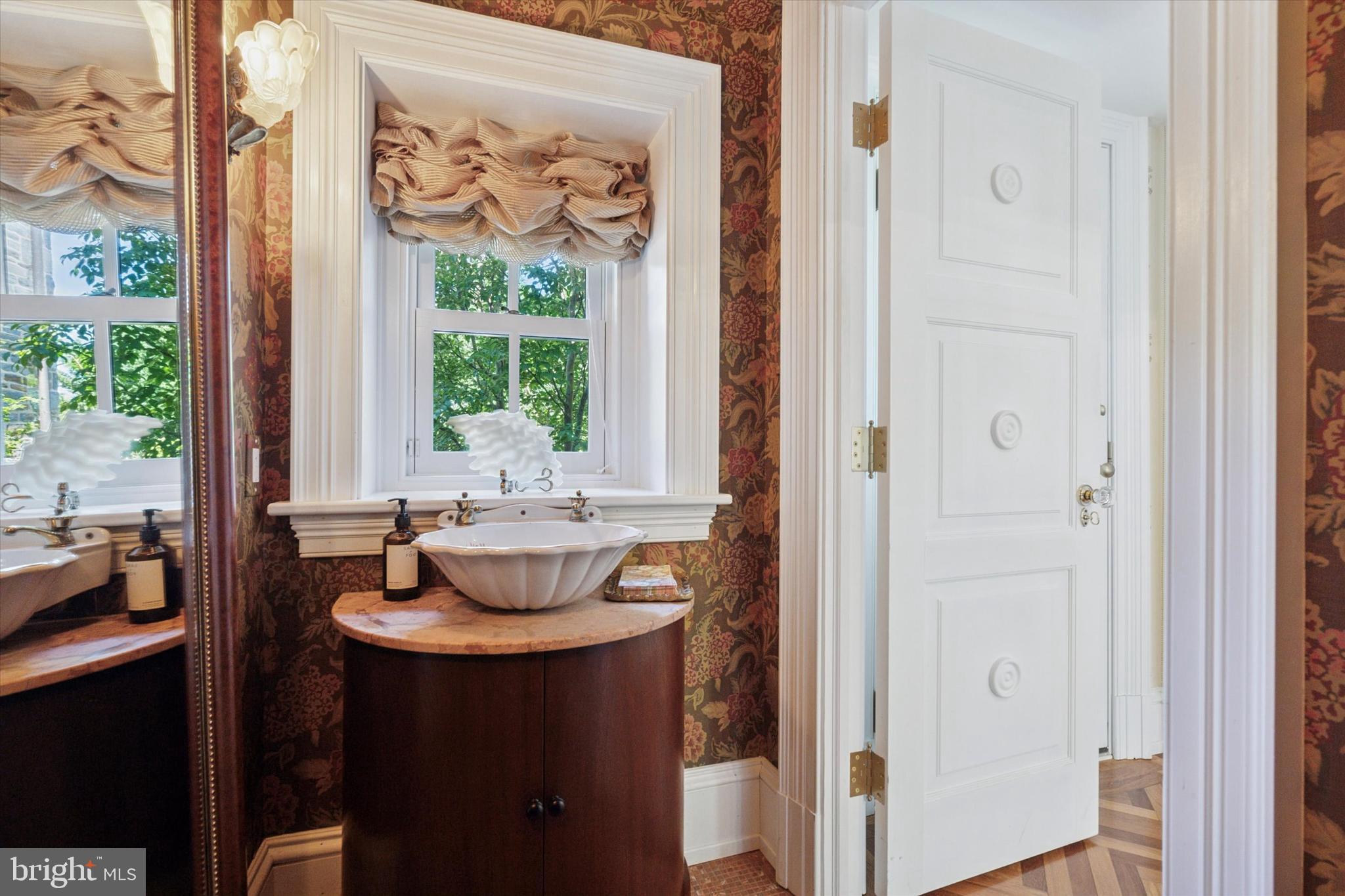 281 Winding Way Merion Station, PA 19066 - Photo 20 of 52 a view of a dining room with a window