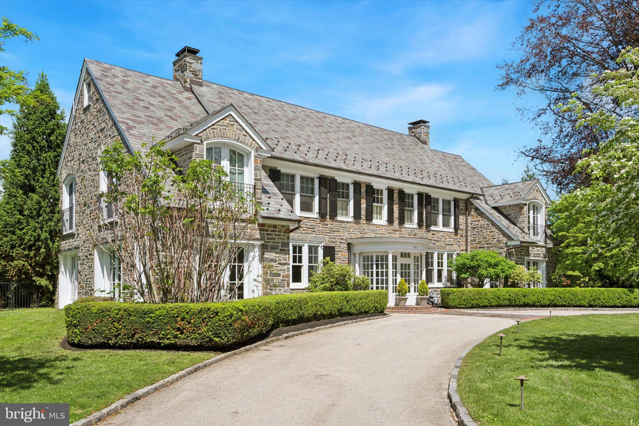 281 Winding Way Merion Station, PA 19066 - Photo 2 of 52 front view of a house with a yard