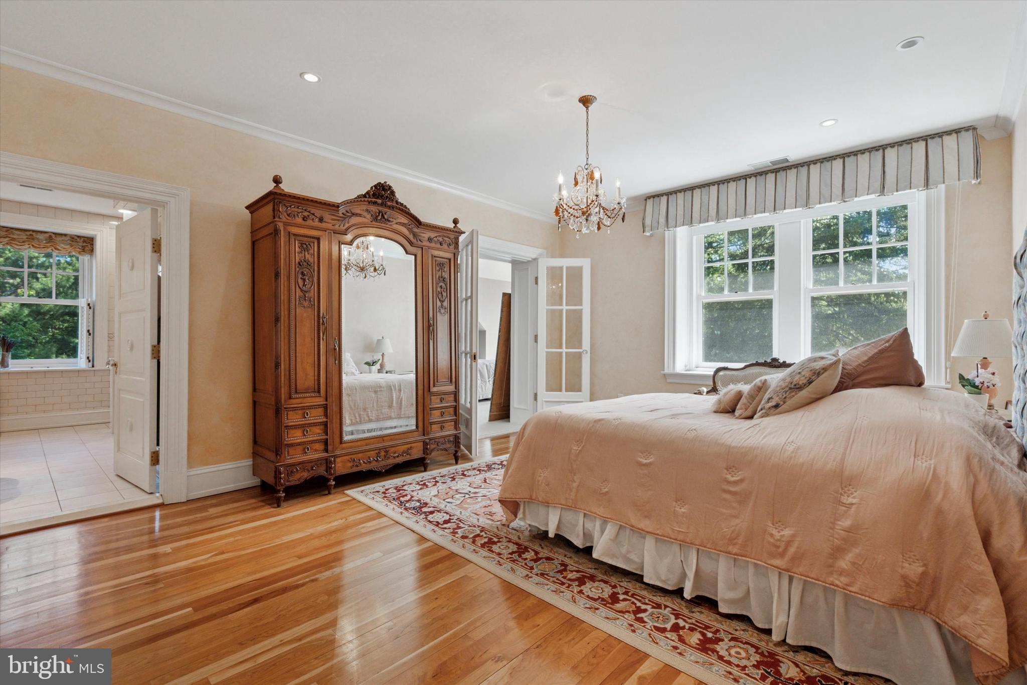 281 Winding Way Merion Station, PA 19066 - Photo 25 of 52 a bedroom with a bed mirror and window
