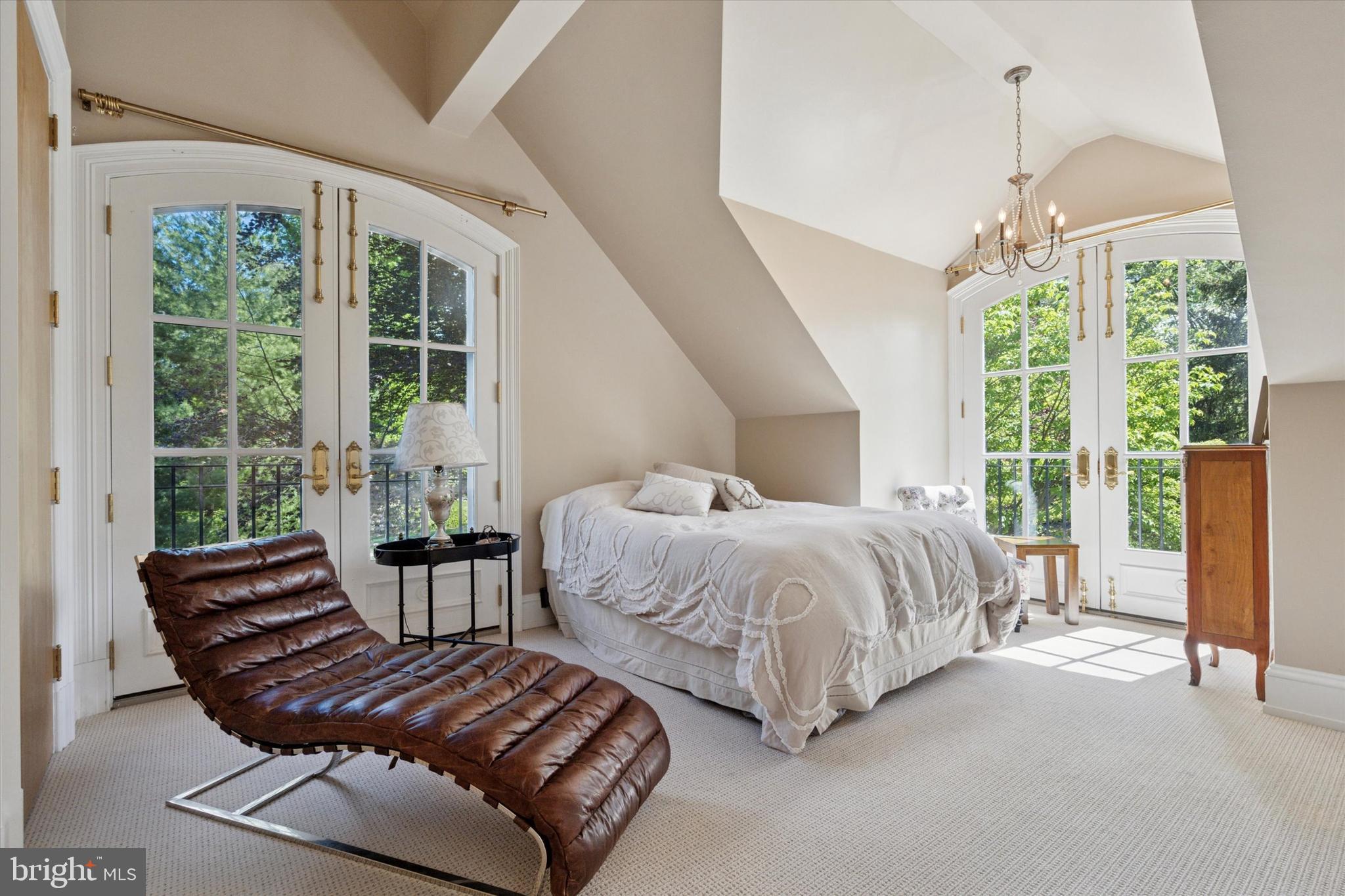 281 Winding Way Merion Station, PA 19066 - Photo 26 of 52 a spacious bedroom with a bed and a large window