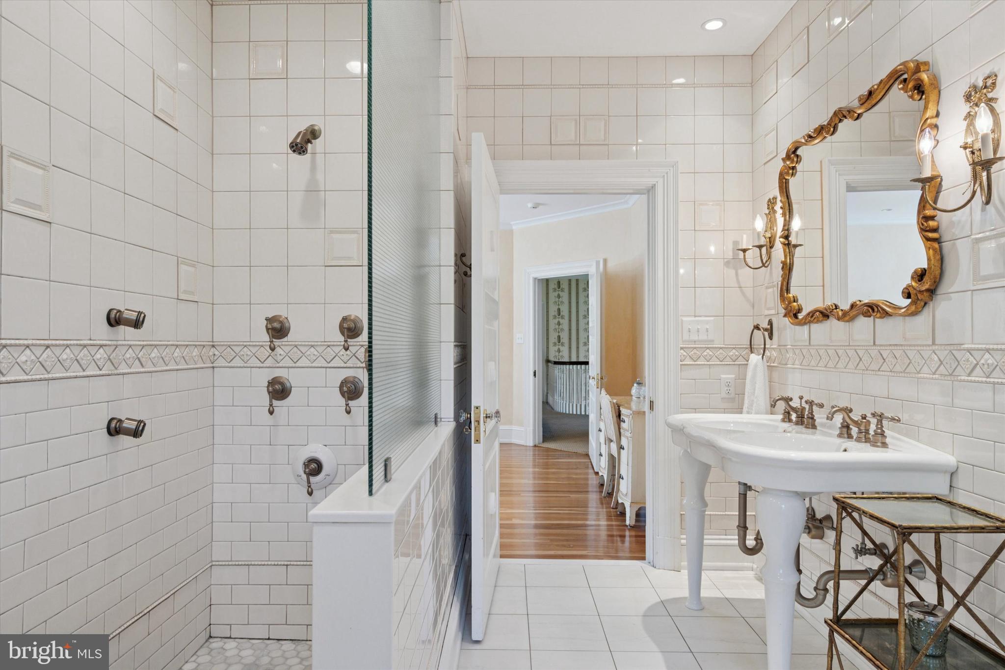 281 Winding Way Merion Station, PA 19066 - Photo 27 of 52 a bathroom with a sink and a mirror