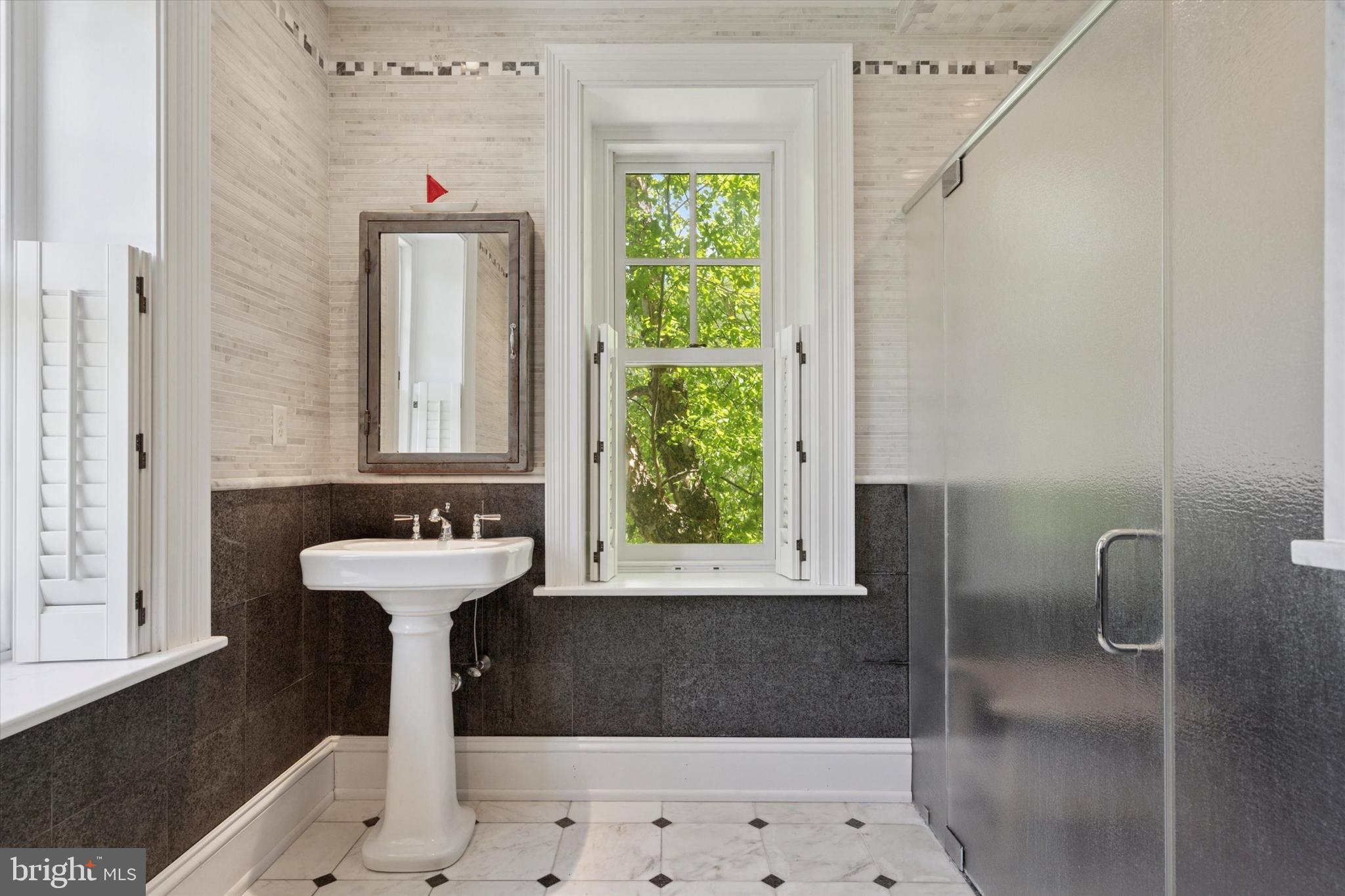 281 Winding Way Merion Station, PA 19066 - Photo 31 of 52 a bathroom with a sink a toilet and window