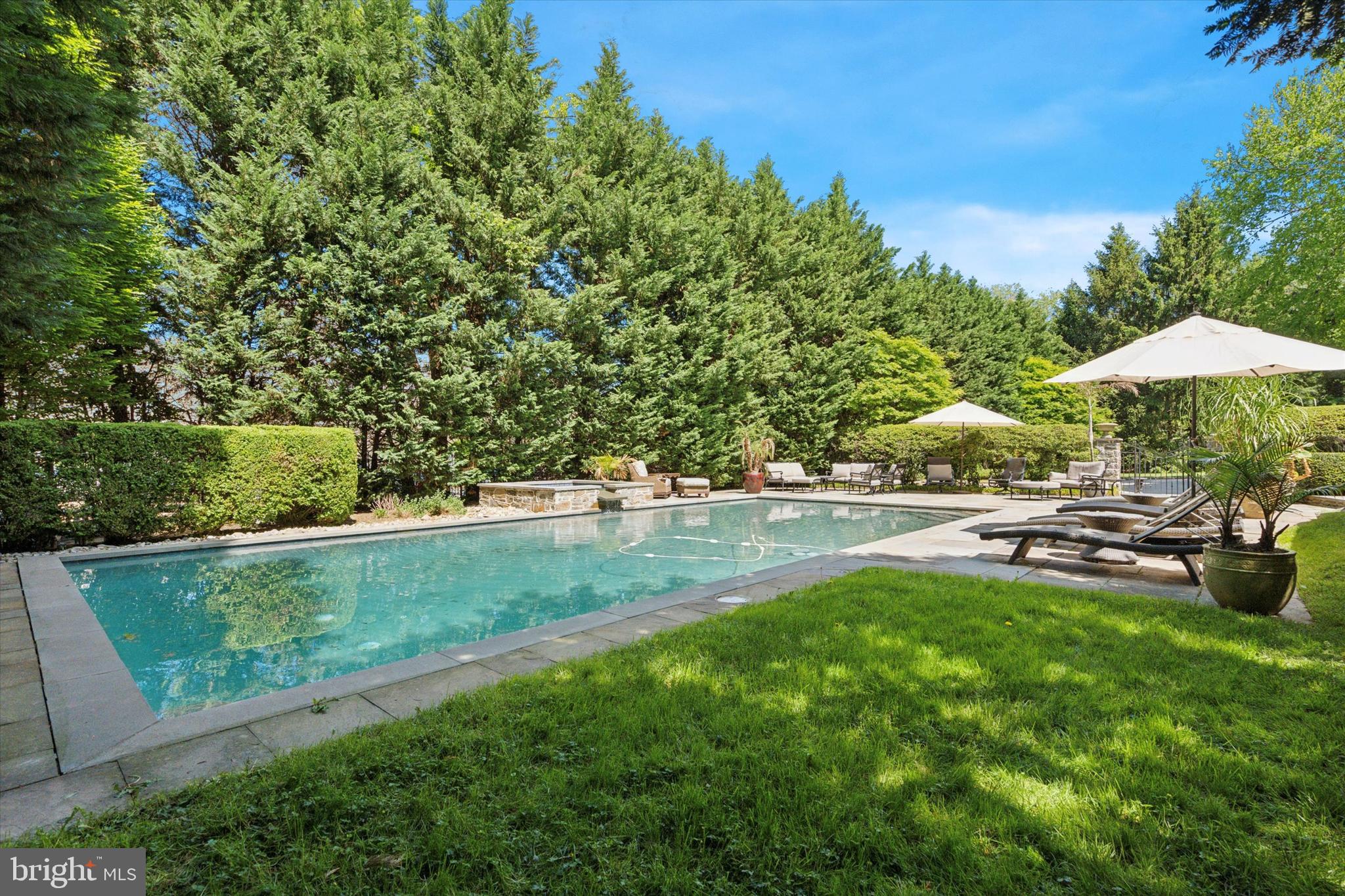 281 Winding Way Merion Station, PA 19066 - Photo 36 of 52 a view of backyard with swimming pool and outdoor seating