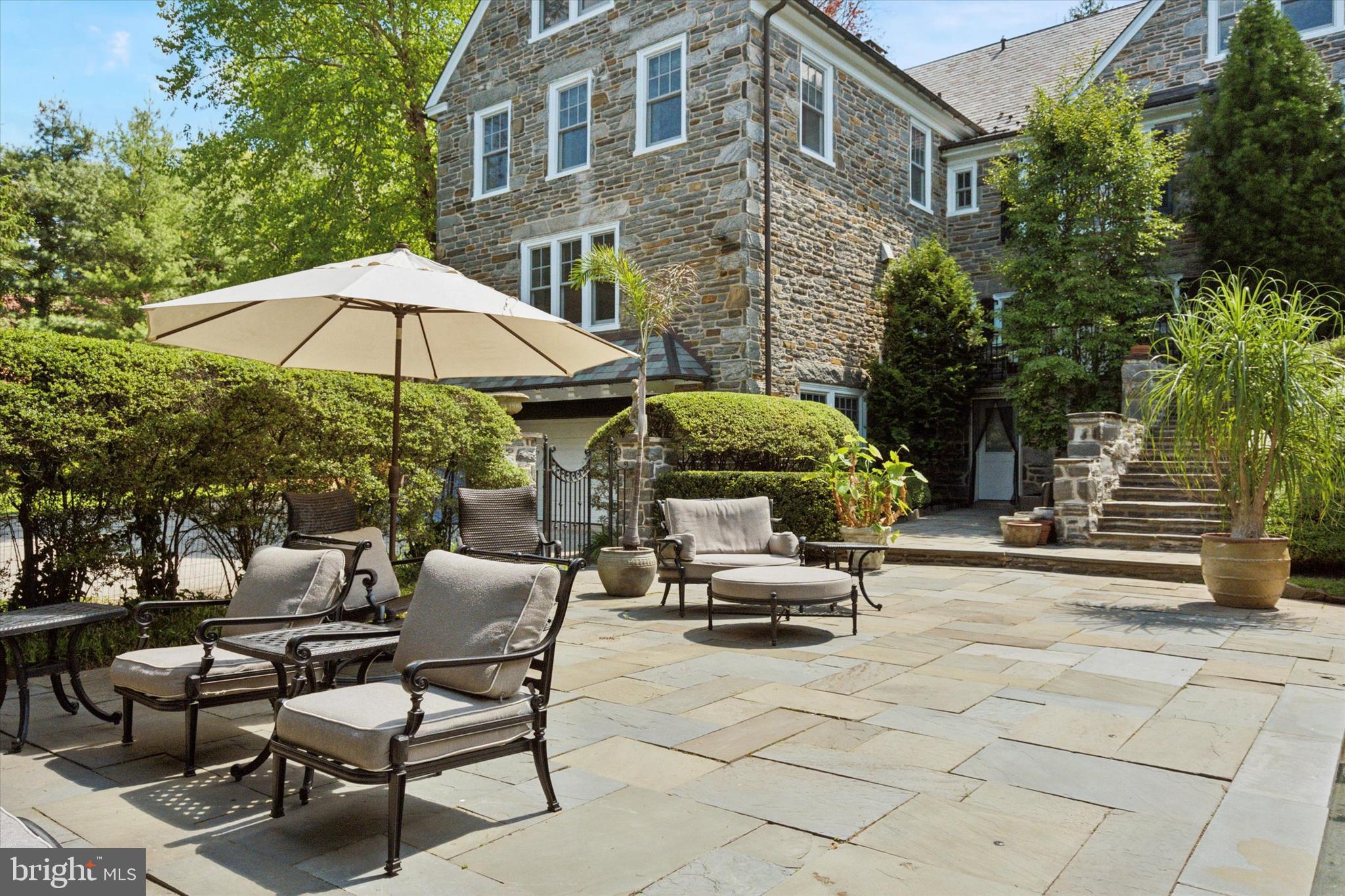 281 Winding Way Merion Station, PA 19066 - Photo 39 of 52 a view of backyard with outdoor seating and trees
