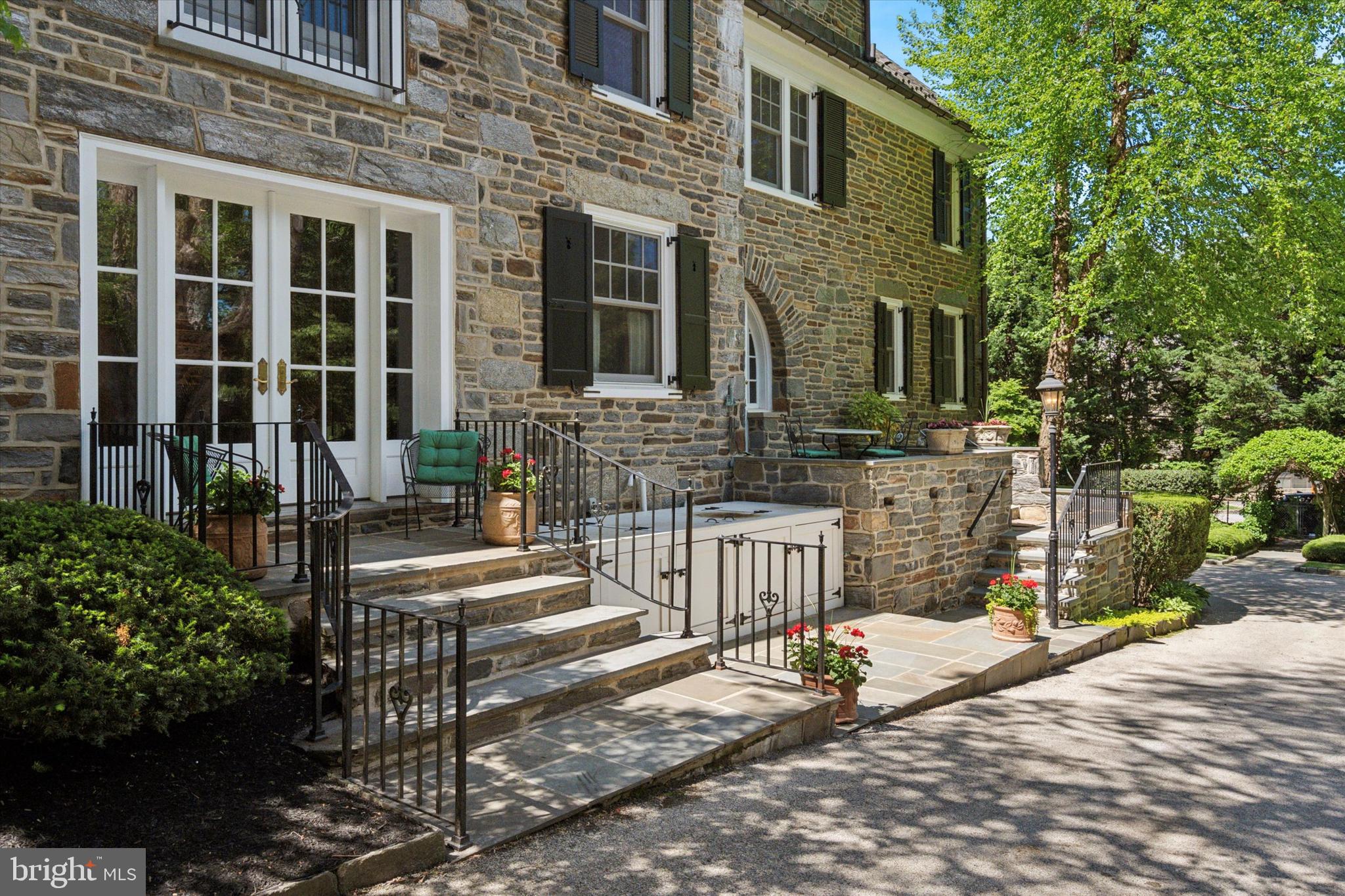 281 Winding Way Merion Station, PA 19066 - Photo 40 of 52 a front view of a house with stairs