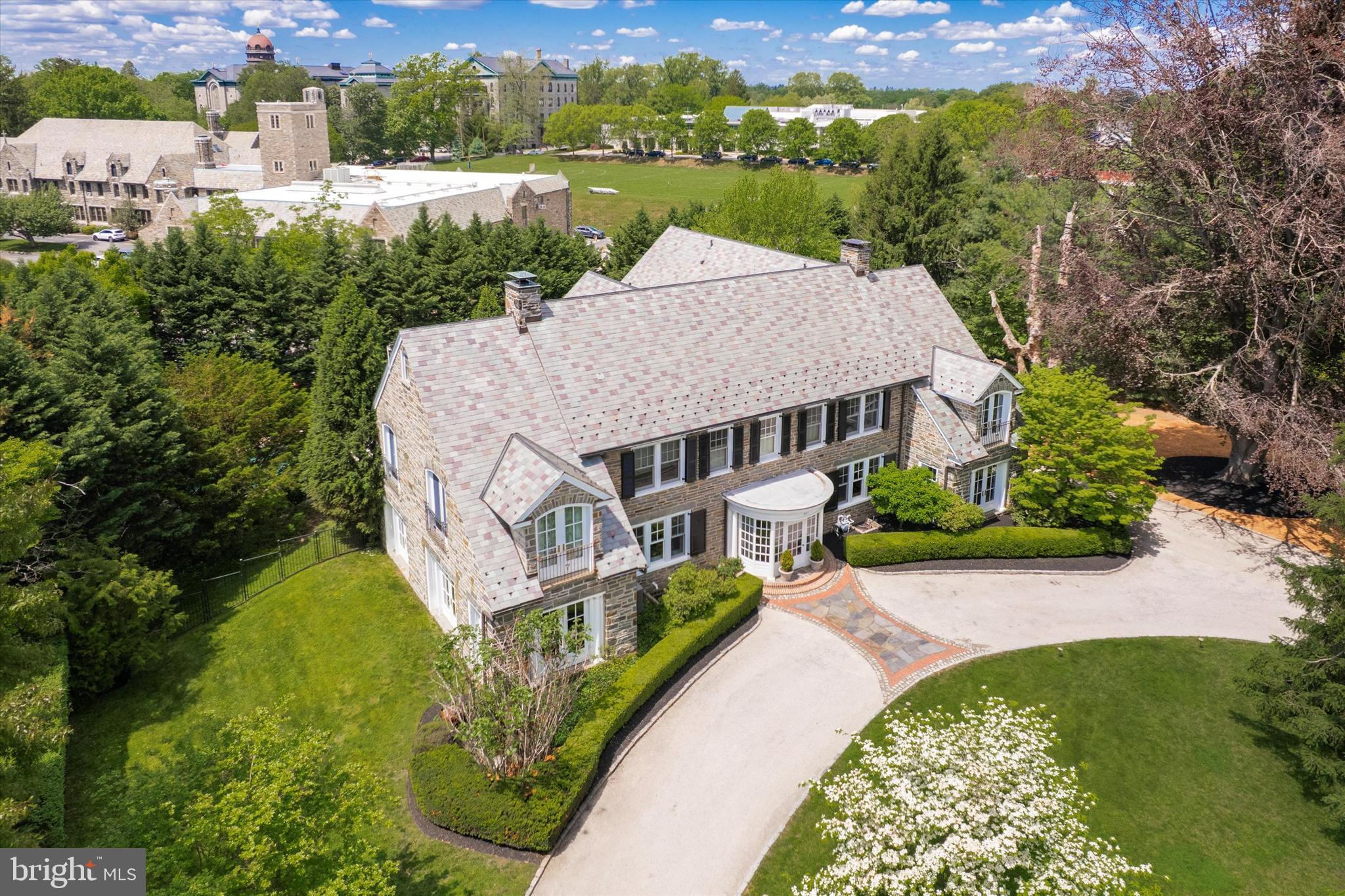 281 Winding Way Merion Station, PA 19066 - Photo 42 of 52 an aerial view of a house with a yard table and chairs