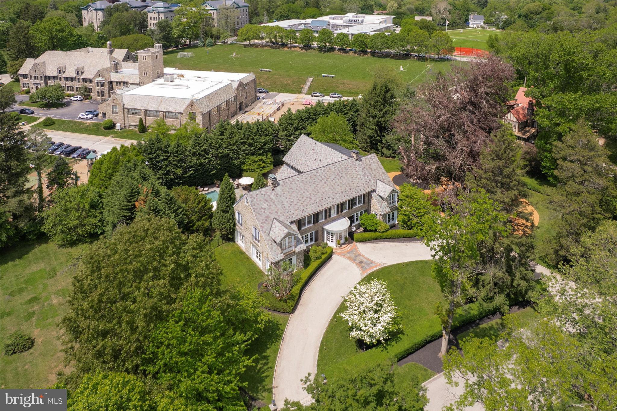 281 Winding Way Merion Station, PA 19066 - Photo 46 of 52 an aerial view of a house with a garden and lake view