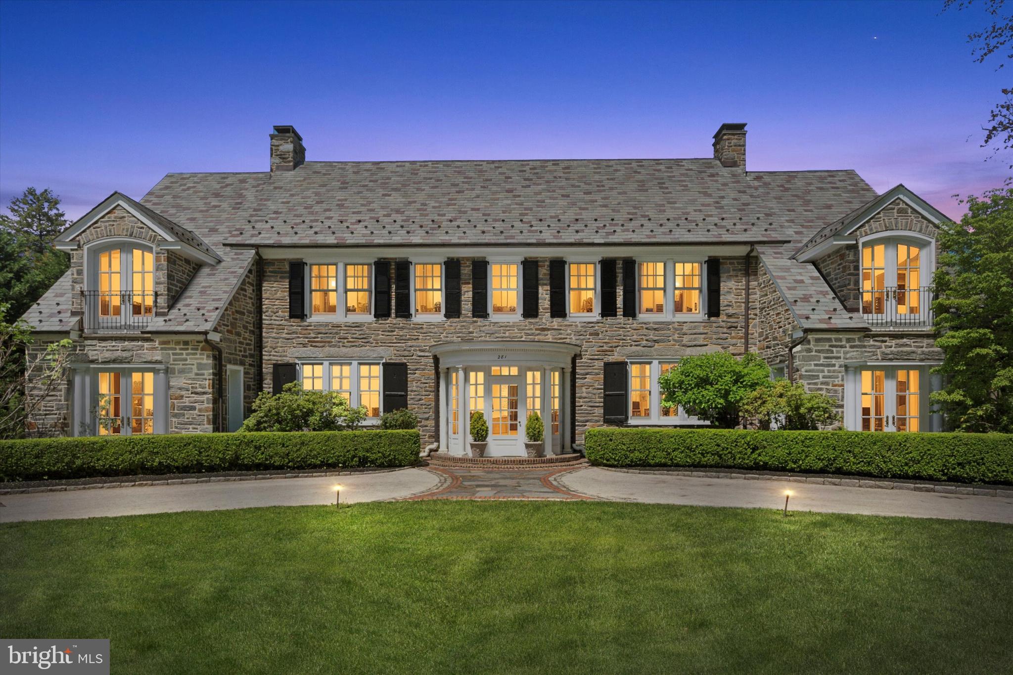 281 Winding Way Merion Station, PA 19066 - Photo 47 of 52 a front view of a house with garden