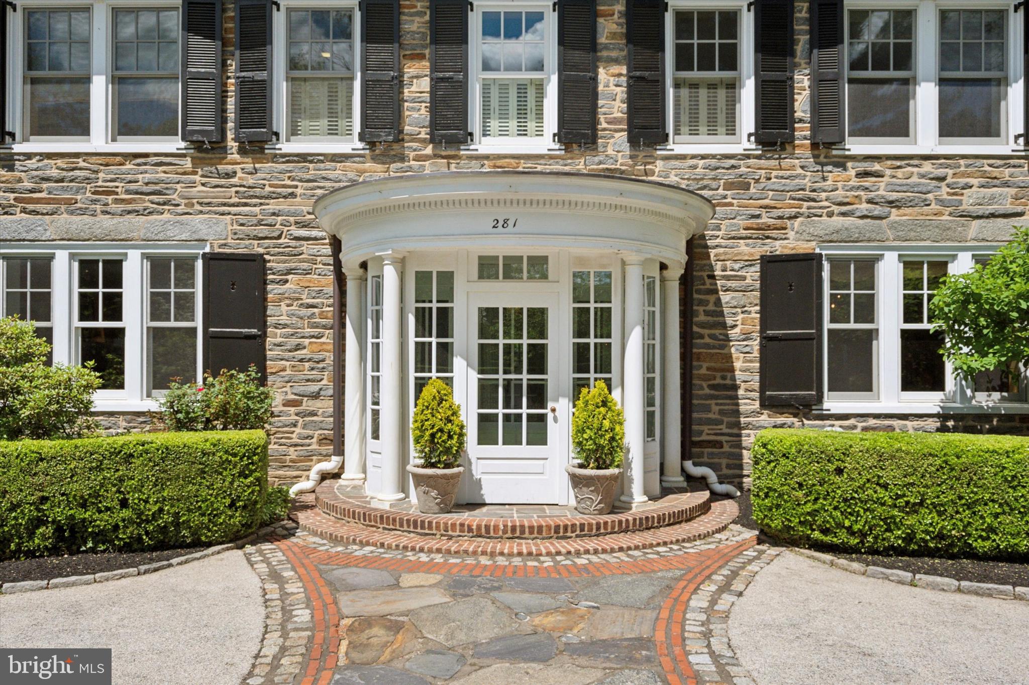 281 Winding Way Merion Station, PA 19066 - Photo 5 of 52 front view of a brick building