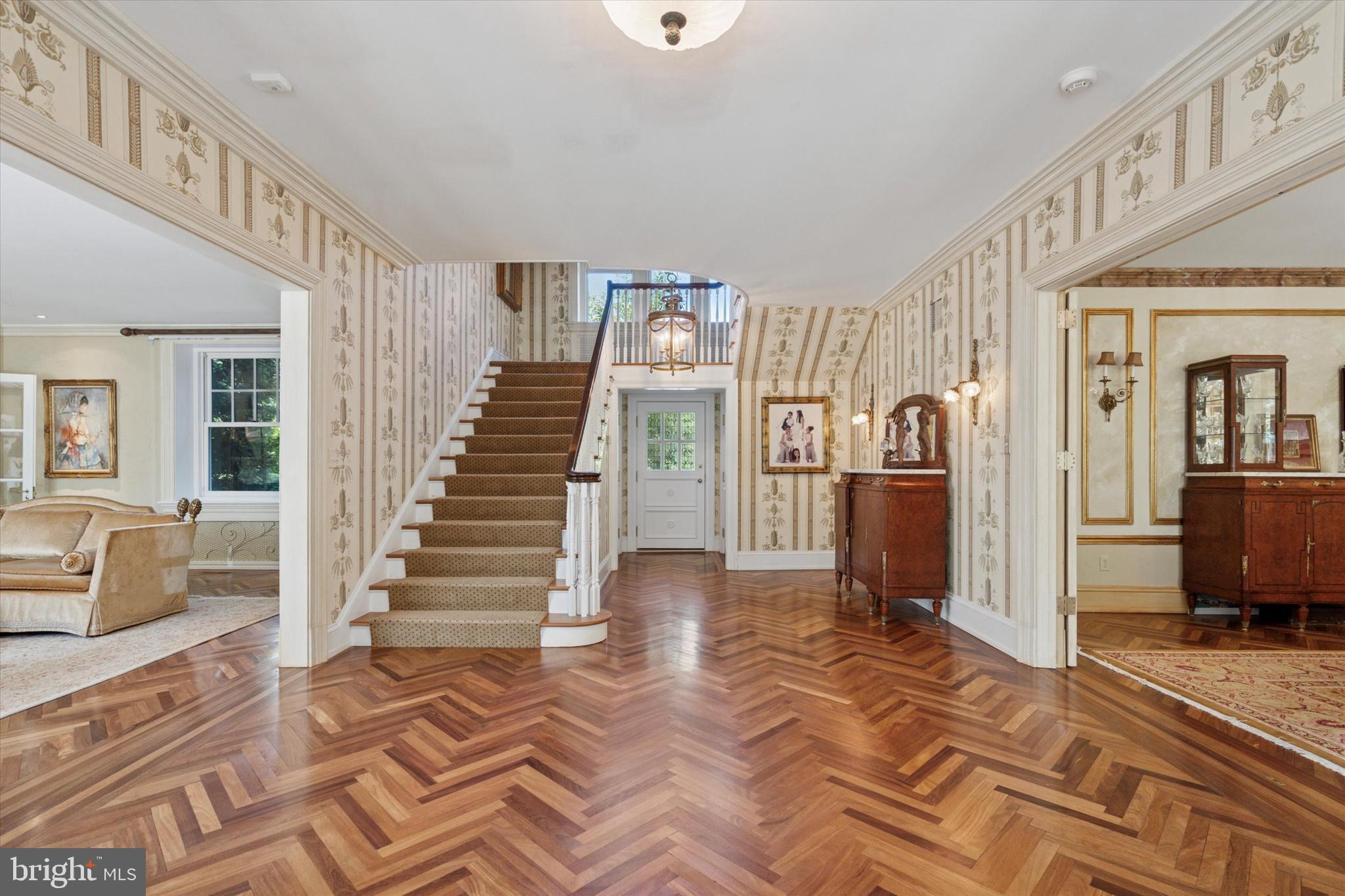 281 Winding Way Merion Station, PA 19066 - Photo 6 of 52 a view of entryway and hall with wooden floor