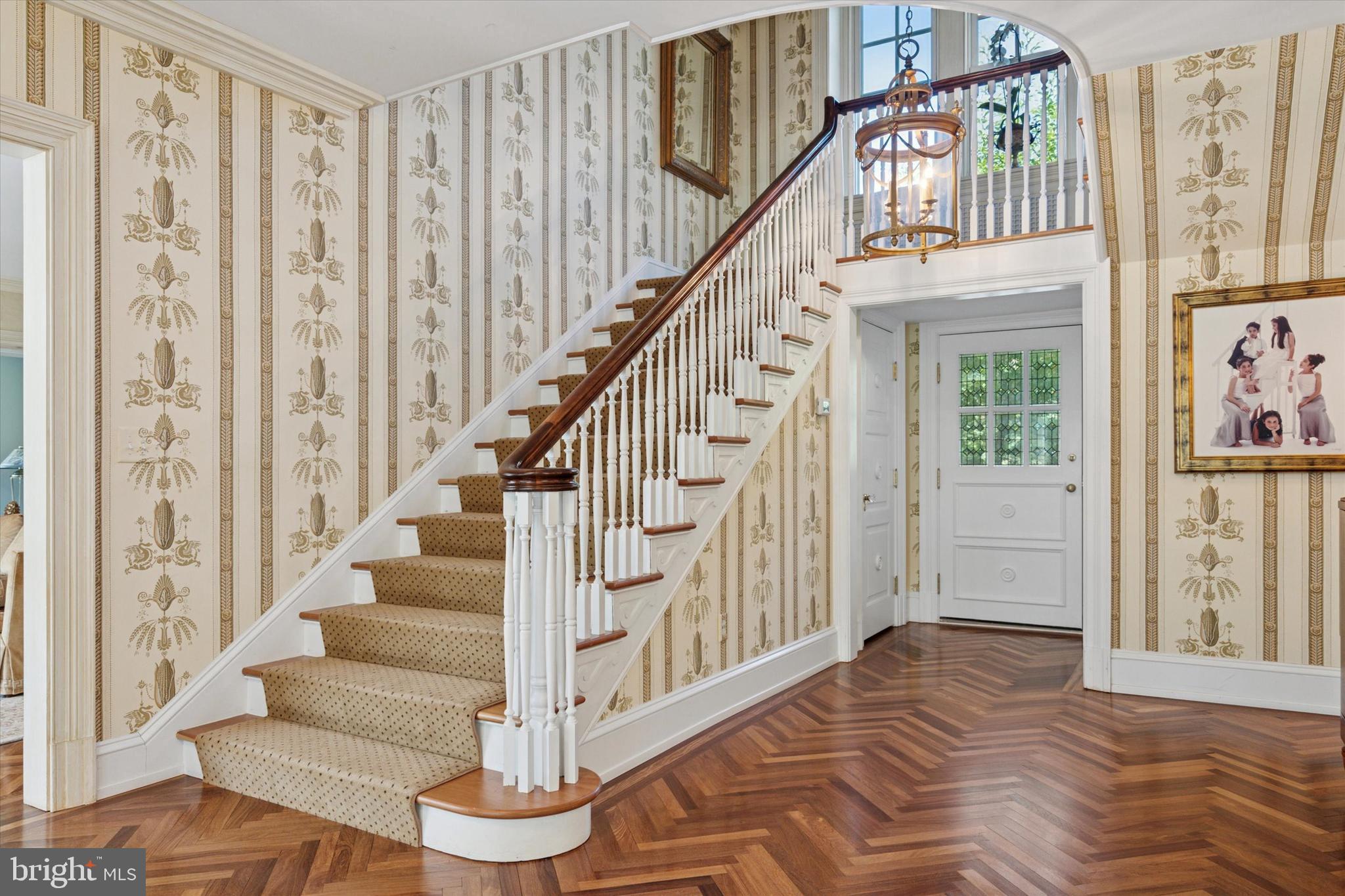 281 Winding Way Merion Station, PA 19066 - Photo 7 of 52 a view of entryway with wooden floor and front door
