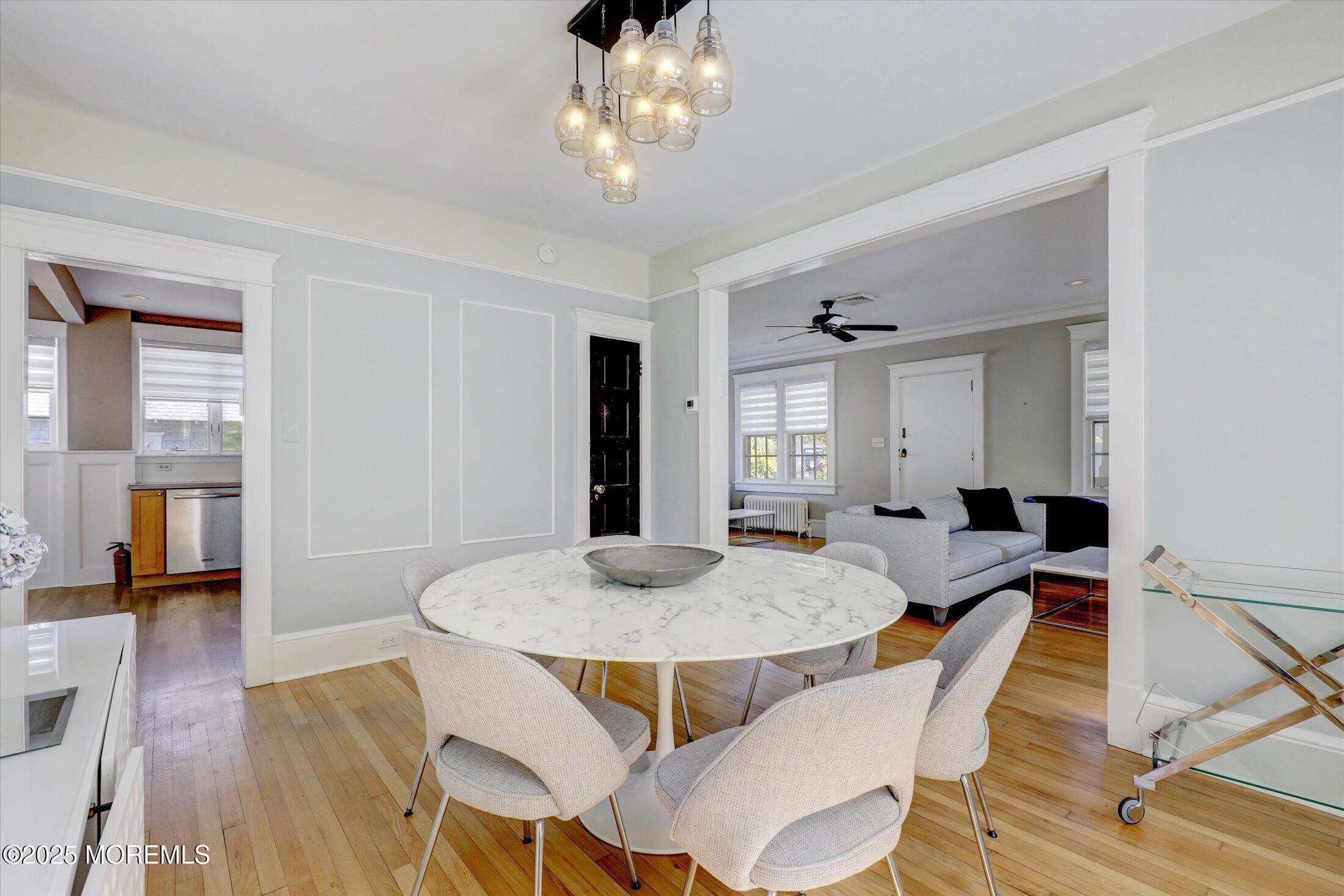 603 Laurel Avenue West Allenhurst, NJ 07711 - Photo 12 of 67 a view of a dining room with furniture and wooden floor