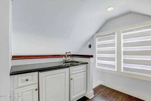 a house with garden in front of it