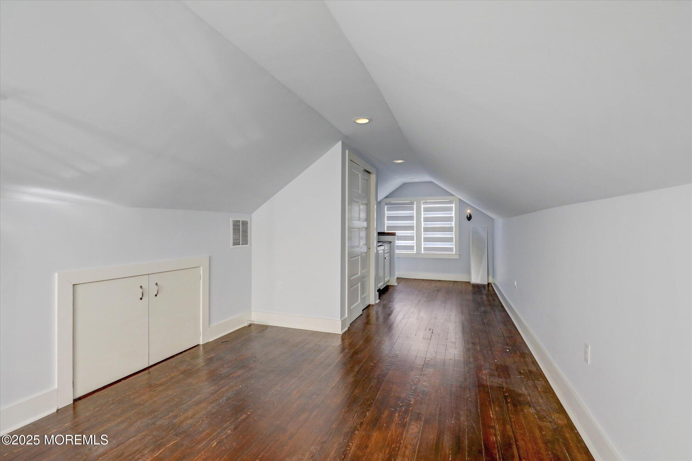 603 Laurel Avenue West Allenhurst, NJ 07711 - Photo 23 of 67 wooden floor in an empty room with a window