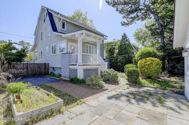 a view of an entrance gate of the house