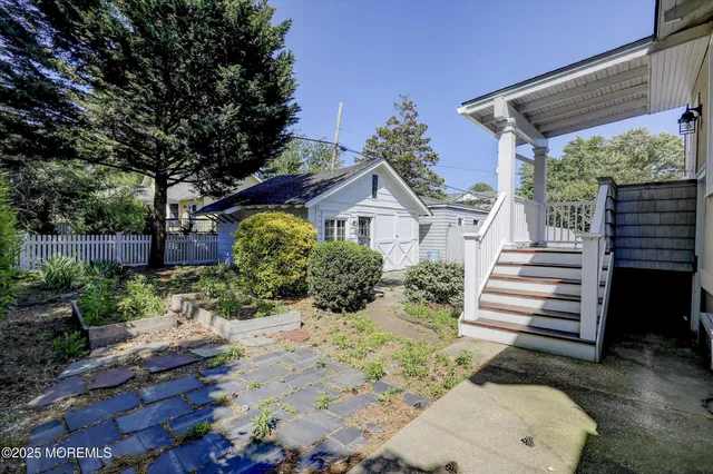 an aerial view of a house with a lake view