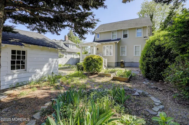 a view of a ocean beach and city