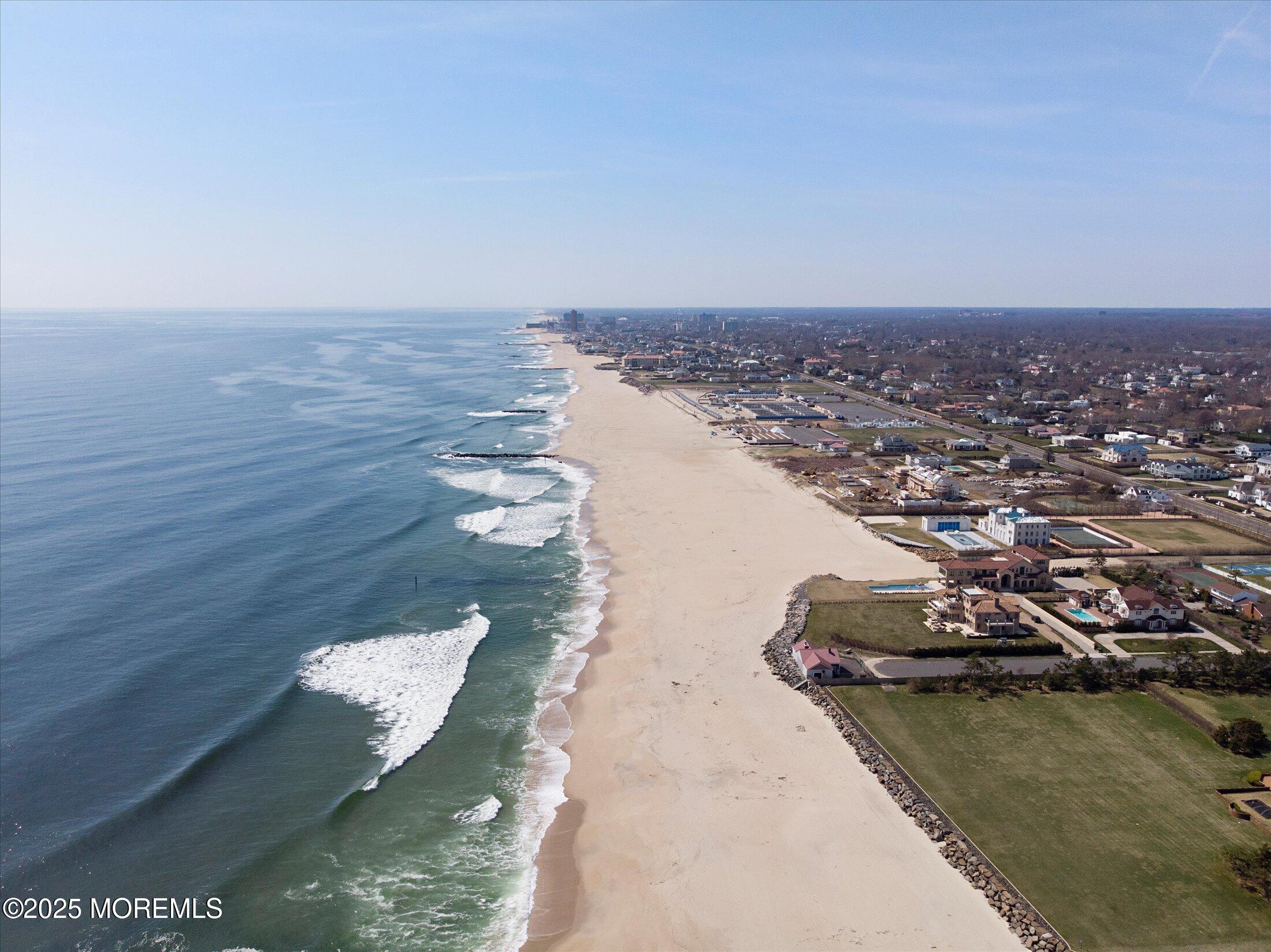 603 Laurel Avenue West Allenhurst, NJ 07711 - Photo 35 of 67 an aerial view of a house with a lake view