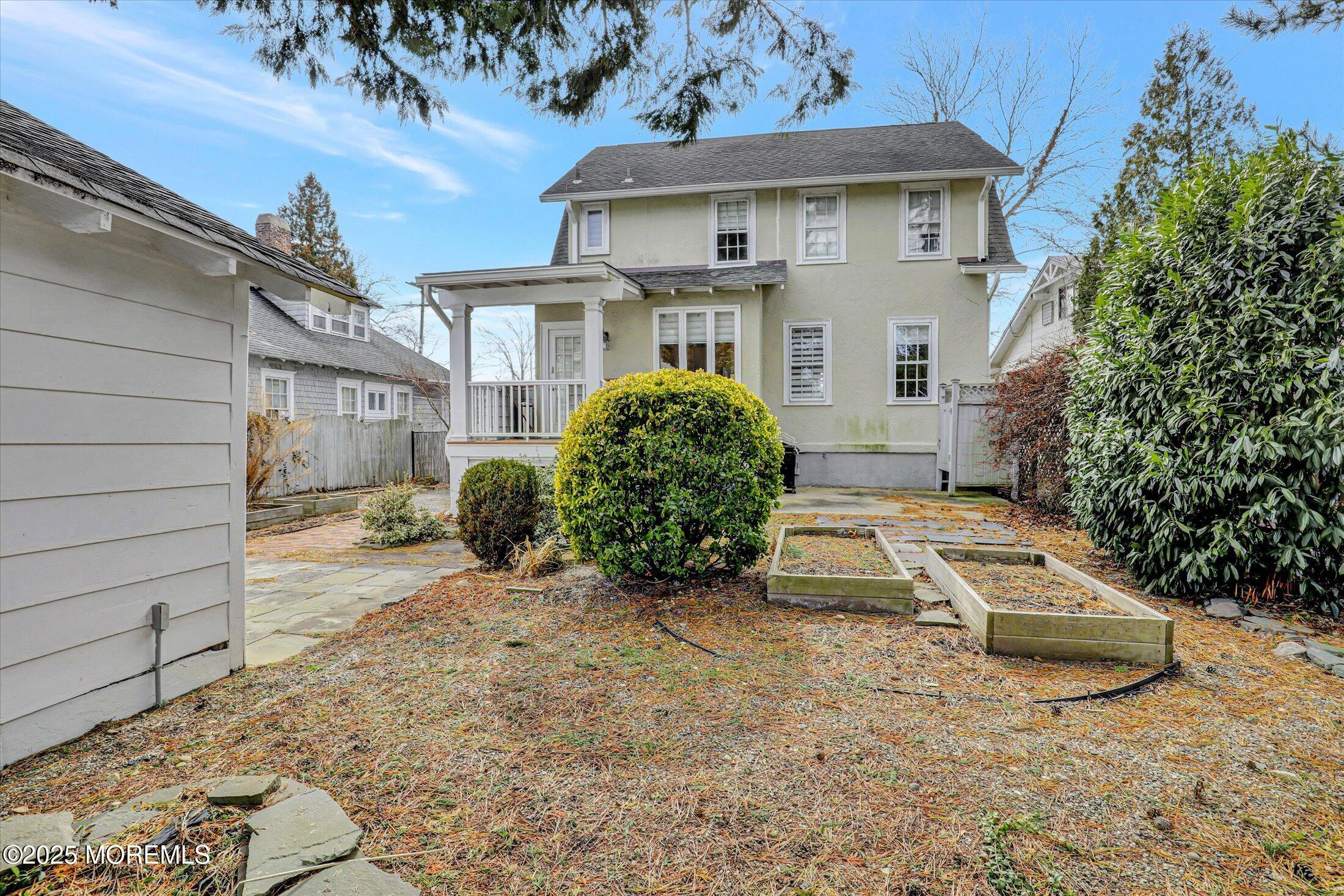603 Laurel Avenue West Allenhurst, NJ 07711 - Photo 63 of 67 a front view of a house with a yard