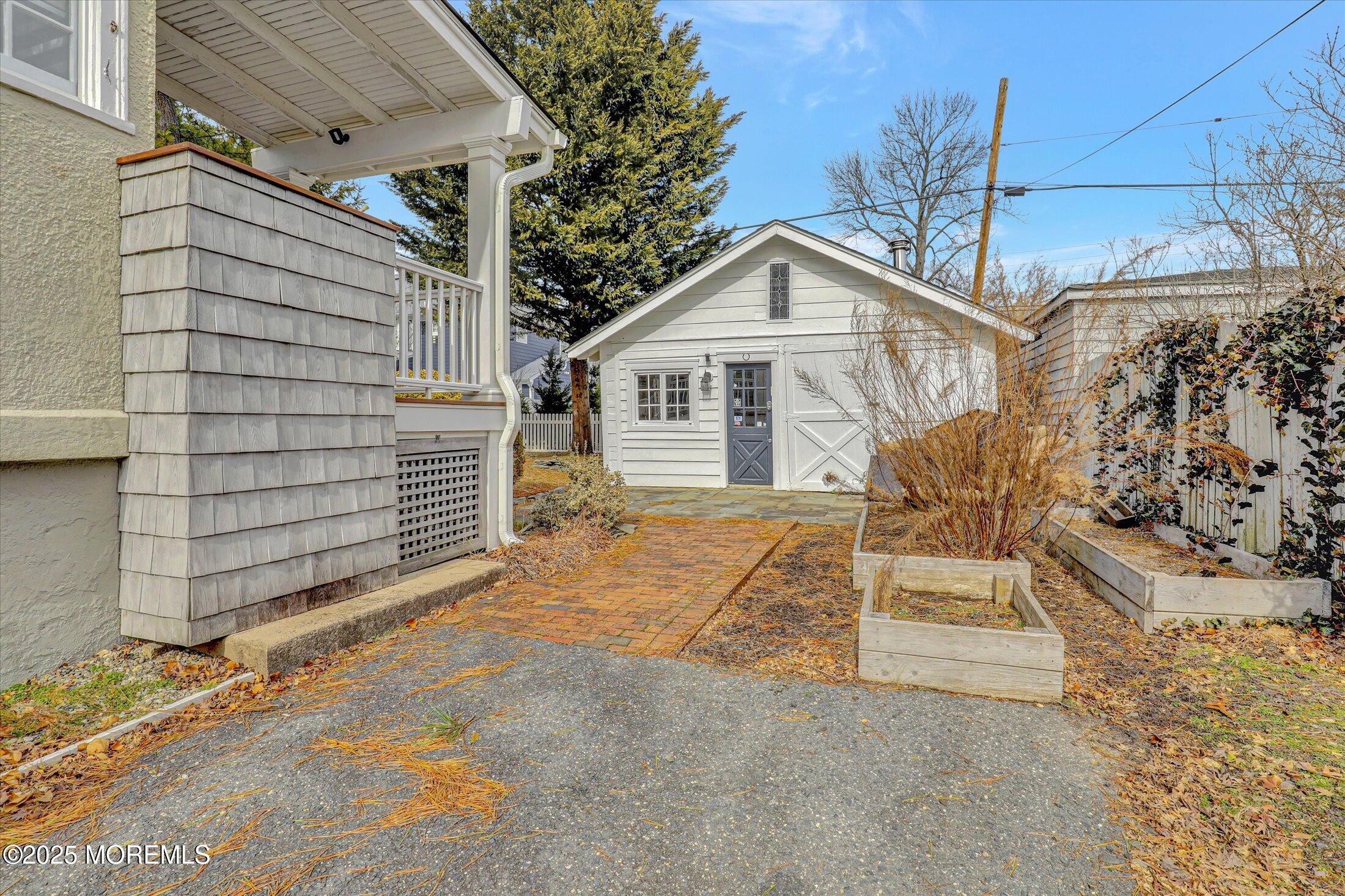 603 Laurel Avenue West Allenhurst, NJ 07711 - Photo 65 of 67 a view of house with a street